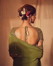 Bollywood Fashionista Ananya Panday in a Green Embroidered Saree with Matching Blouse Pictures 03