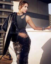 Bollywood Hottie Malaika Arora in a Black Sleeveless Ribbed Bodysuit with a Faux Leather Skirt Photos 03