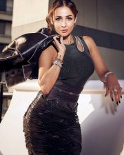 Bollywood Hottie Malaika Arora in a Black Sleeveless Ribbed Bodysuit with a Faux Leather Skirt Photos 04
