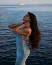 Bollywood actress Jacqueline Fernandez in a Pastel Blue Halter Neck Sequined Bodycon Dress at Cannes 2025 Photos 02