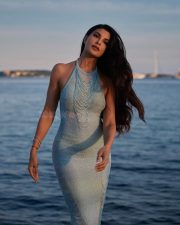 Bollywood actress Jacqueline Fernandez in a Pastel Blue Halter Neck Sequined Bodycon Dress at Cannes 2025 Photos 04