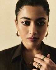 Boss Lady Rashmika Mandanna in a Black Metallic Buttoned Top and Long Flowing Skirt Photos 01