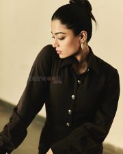 Boss Lady Rashmika Mandanna in a Black Metallic Buttoned Top and Long Flowing Skirt Photos 04