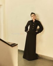 Boss Lady Rashmika Mandanna in a Black Metallic Buttoned Top and Long Flowing Skirt Photos 07
