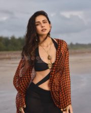 Breathtaking Actress Rakul Preet Singh in a Black Bikini Top Orange Print Kimono Photos 04