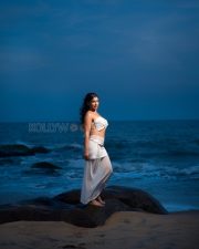 Breathtaking Actress Yashika Aannand in a White Strapless Tube Top Sheer Maxi Skirt Photos 02