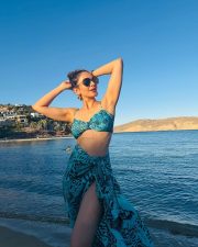 Breezy Actress Rakul Preet Singh in a Teal Animal Print Bikini With Sarong Photos 01