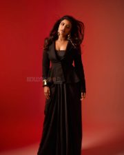 Captivating Actress Aishwarya Rajesh in a Black Peplum Blazer And Draped Skirt Photos 01