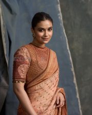 Captivating Actress Keerthy Suresh in a Peach Embroidered Saree Photos 01