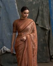 Captivating Actress Keerthy Suresh in a Peach Embroidered Saree Photos 04