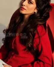Captivating Actress Malavika Mohanan in a Red Button Blazer and Jeans Photos 05
