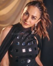 Captivating Actress Rakul Preet Singh in a Black Structured Mirror Grid Halter Top Photos 04