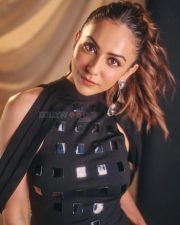 Captivating Actress Rakul Preet Singh in a Black Structured Mirror Grid Halter Top Photos 04