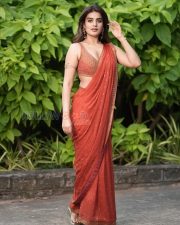 Captivating Nidhhi Agerwal Cleavage in a Rust Red Sequinned Saree Photos 02