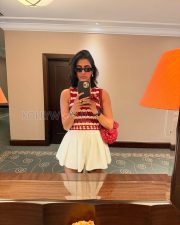 Carefree Actress Pooja Hegde in a Denim Corset Mini Dress Photos 01