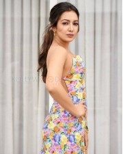 Catherine Tresa in a Colourful Floral Top Photos 04