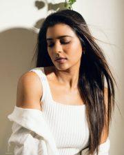 Charming Actress Aishwarya Rajesh in a White Ribbed Tank and Open Shirt and Jeans Photos 01