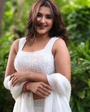 Charming Actress Malavika Sharma in a White Pearl Embellished Crop Blouse with White Saree Photos 02