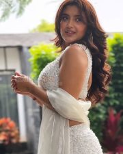 Charming Actress Malavika Sharma in a White Pearl Embellished Crop Blouse with White Saree Photos 03