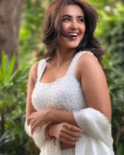 Charming Actress Malavika Sharma in a White Pearl Embellished Crop Blouse with White Saree Photos 05