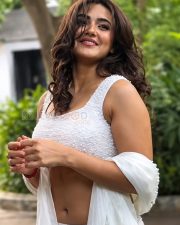 Charming Actress Malavika Sharma in a White Pearl Embellished Crop Blouse with White Saree Photos 10