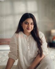 Charming Actress Nivetha Thomas in a White Linen Kurta Photos 04