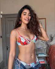Charming Actress Pooja Hegde in a Colorful Printed Bikini Top Photos 01