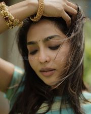 Charming Aishwarya Lekshmi in a Turquoise Traditional Silk Saree Pictures 02