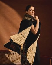 Charming Indian Actress Regena Cassandrra in a Black Silk Cape Dress Photos 01