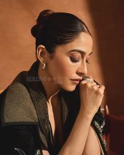 Charming Indian Actress Regena Cassandrra in a Black Silk Cape Dress Photos 04