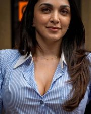Charming Kiara Advani Cleavage in a Blue striped open collar shirt Photos 01