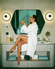 Charming Malaika Arora Legs in a White Spa Robe Photos 02