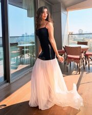 Charming Pooja Hegde in a Black and White Pleated Dress Pictures 05