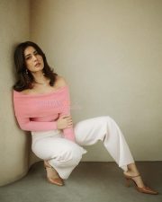 Charming Raashi Khanna in a Pink Knitted Off Shoulder Sweatshirt with a White Formal Pants Photos 08