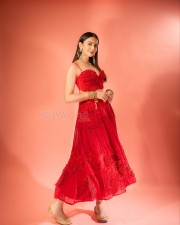 Charming Rakul Preet Singh in a Red Floral Dress with Gold Accessories Photos 01