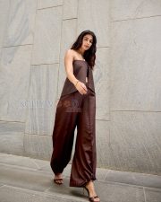 Chic Actress Pooja Hegde in a Dark Chocolate Brown Strapless Bandeau Crop Top Wide Leg Satin Trousers Photos 03