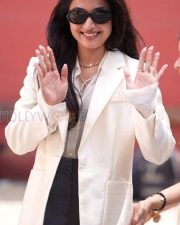 Chic Actress Rashmika Mandanna in a Cream Blazer and Grey Wide Leg Trousers Photos 01