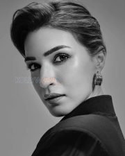 Cocktail 2 Actress Kriti Sanon in a Black Sheer Belted Blouse Photos 02