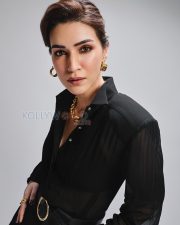 Cocktail 2 Actress Kriti Sanon in a Black Sheer Belted Blouse Photos 03