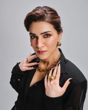 Cocktail 2 Actress Kriti Sanon in a Black Sheer Belted Blouse Photos 04