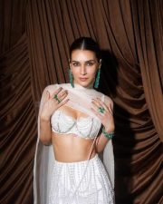 Cocktail 2 Actress Kriti Sanon in a Pearl Ivory Bralette with a High Waisted Mermaid Column Skirt and a Sheer Dupatta Photos 01