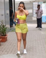 Confident Actress Malaika Arora in a Yellow Reebok Sports Bra and Shorts Photos 03