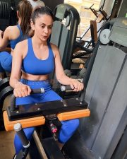 Confident Actress Rakul Preet Singh in a Blue Sports Bra And Leggings Photos 01