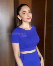 Confident Actress Rakul Preet Singh in a Royal Blue Athletic Crop Top and Leggings Photos 01