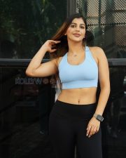Confident Actress Yashika Aannand in a Light blue sports bra Photos 01