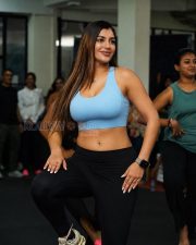 Confident Actress Yashika Aannand in a Light blue sports bra Photos 06