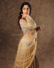 Coolie Actress Reba Monica John in a Golden Outfit Photos 02