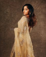 Coolie Actress Reba Monica John in a Golden Outfit Photos 04