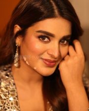 Cute Nidhhi Agerwal in a Mirror Covered Two Piece Dress with a Matching Jacket Photos 03