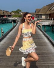 Cute Rakul Preet Singh in a Yellow and White Printed Bralette Top and Mini Skirt Pictures 03